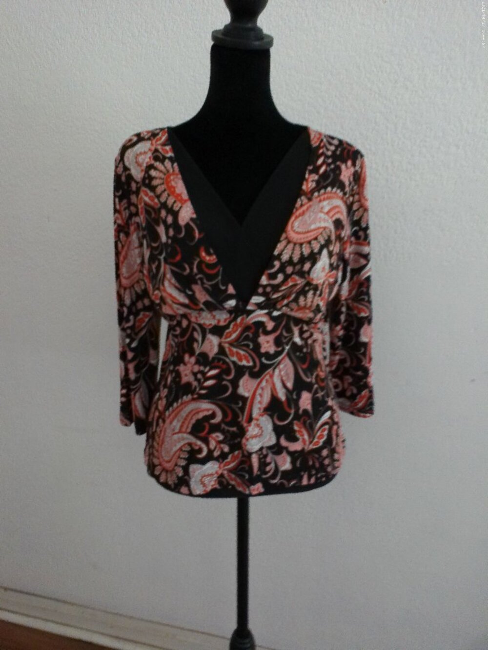 Orange/black floral V-neck blouse,